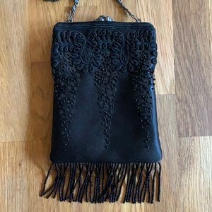 Black embroidered vintage purse.